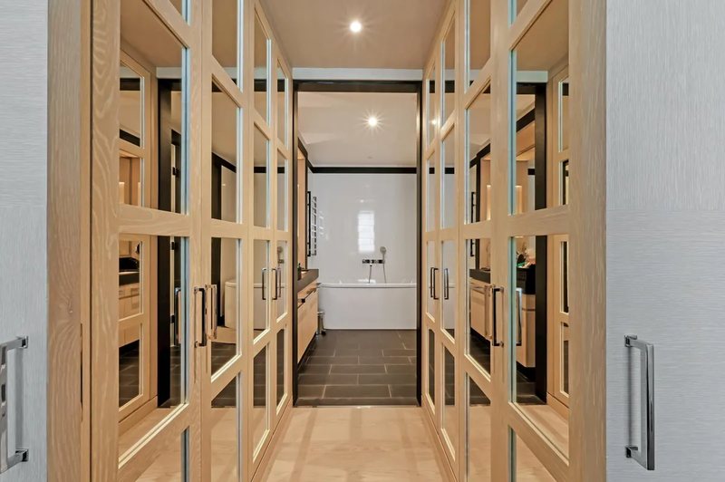 Hallway with glazed wardrobe doors