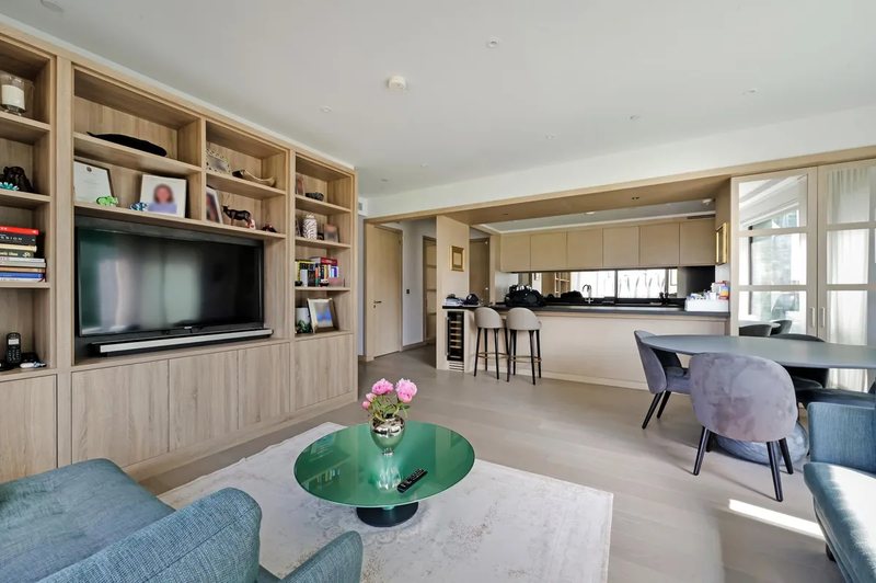 Living room with fitted shelving