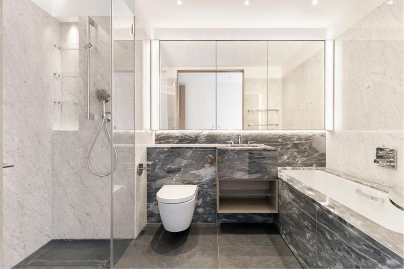 Bathroom with bath and shower