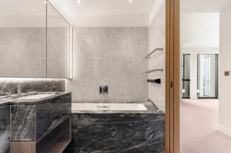 Bathroom with marble bath