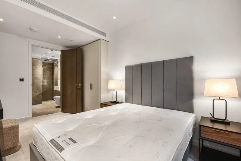 Bedroom with upholstered headboard