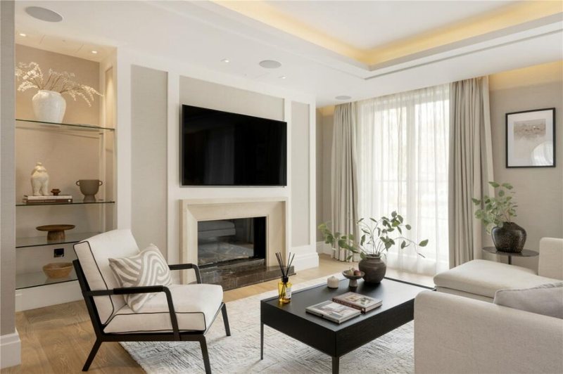 Bright living room with a stone fireplace